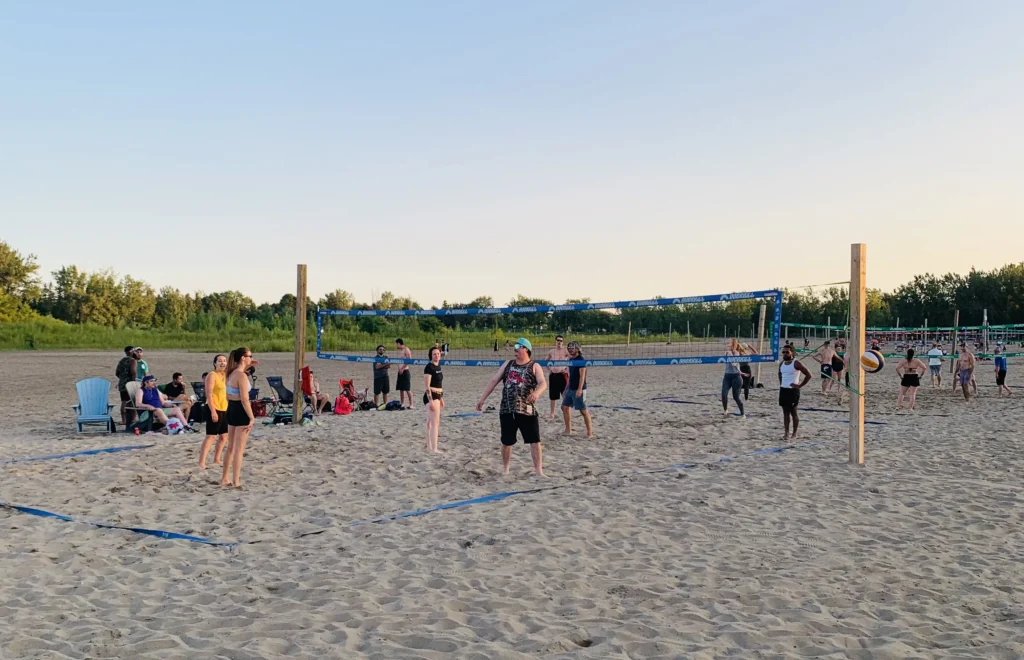 A picture in the woodbine beach where some of the players playing volleyball